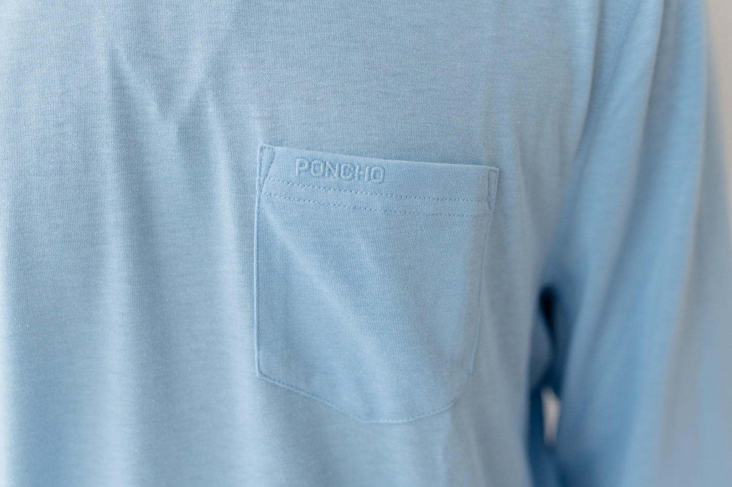 Embroidered Poncho Performance Crewneck